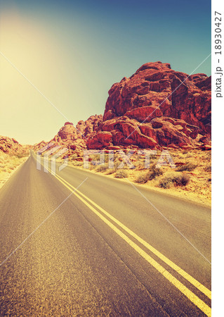 Vintage toned desert highway, travel concept, USA Vintage toned desert highway, travel concept, USA 18930427