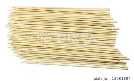 Pile of Wooden Skewers on A White Background Pile of Wooden Skewers on A White Background 18931894
