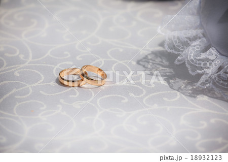 Two weddings rings on a background a fabric 18932123