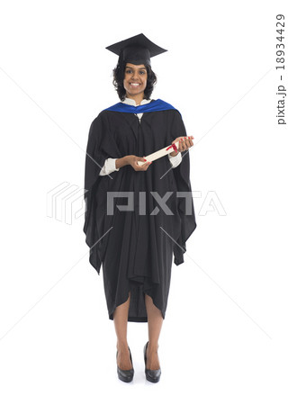 Portrait of a female graduate with her diploma Portrait of a female graduate with her diploma 18934429