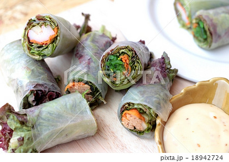 Vegetable salad wrapped into spring rolls 18942724