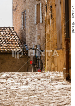 Bicycle on a street of an old town in the Europe 18944240