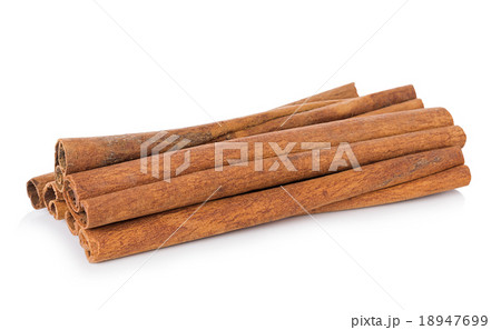 cinnamon on white background cinnamon on white background 18947699
