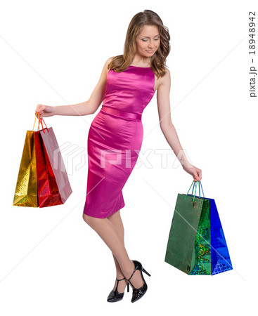 Shopping woman holding bags, isolated on white Shopping woman holding bags, isolated on white 18948942