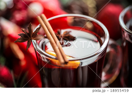 Christmas hot mulled wine with spices on a wooden Christmas hot mulled wine with spices on a wooden 18955459