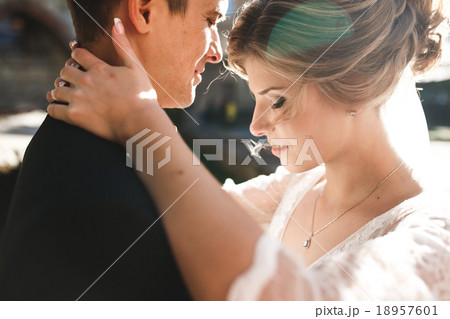 bride and groom posing on the streets bride and groom posing on the streets 18957601