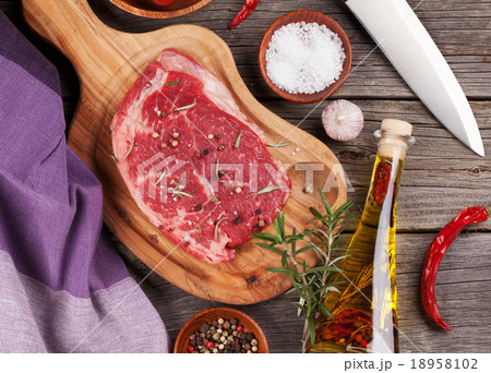 Raw beef steak and spices 18958102