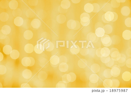 blurred golden background with bokeh lights 18975987