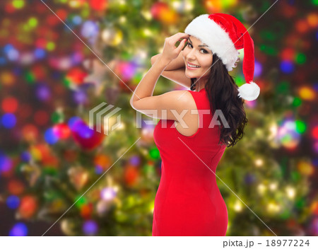 beautiful sexy woman in santa hat and red dress 18977224