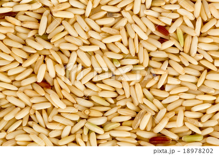 Natural many brown rice food grain texture 18978202