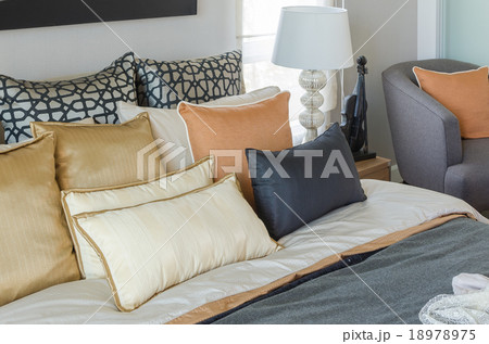 pillows on luxury bed with white lamp in bedroom pillows on luxury bed with white lamp in bedroom 18978975