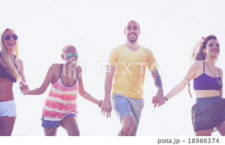 Diverse Beach Summer Friends Holding Hands Concept Diverse Beach Summer Friends Holding Hands Concept 18986374