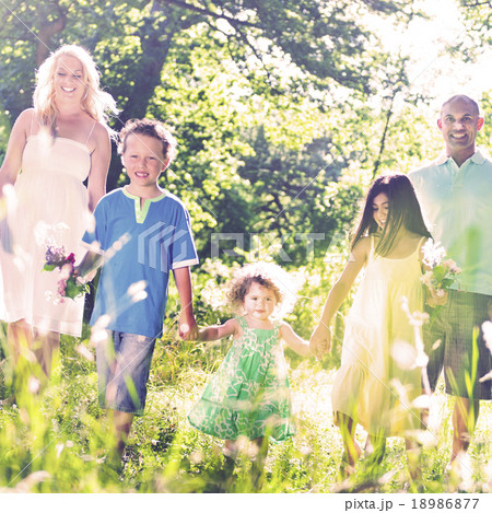 Family holding hands walking together Concept 18986877