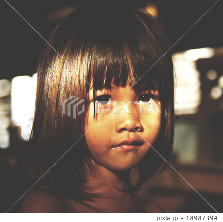 Little girl staring at the camera Cute Innocence Concept Little girl staring at the camera Cute Innocence Concept 18987394