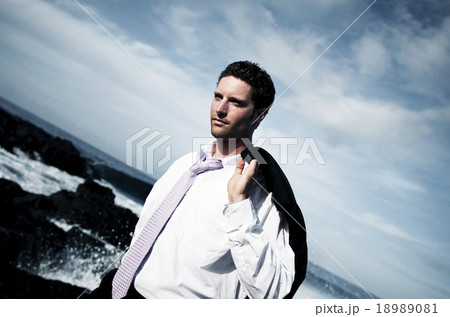 Businessman Relaxation Confusion Coastline Vacation Concept 18989081
