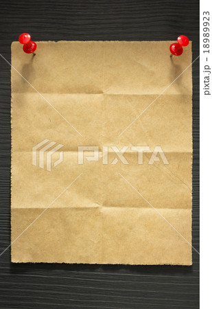 folded note paper on wood 18989923