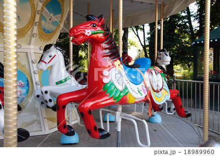 Colourful vintage carousel in a summer park. 18989960