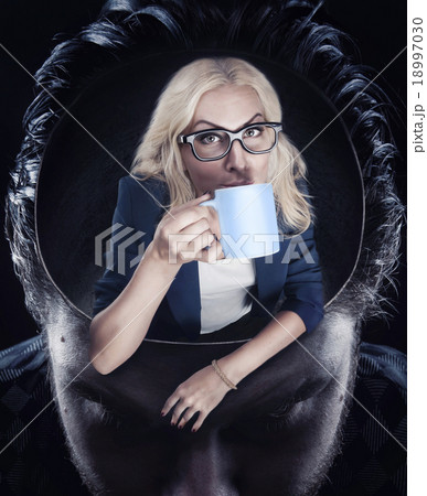 Woman drinking coffee Woman drinking coffee 18997030