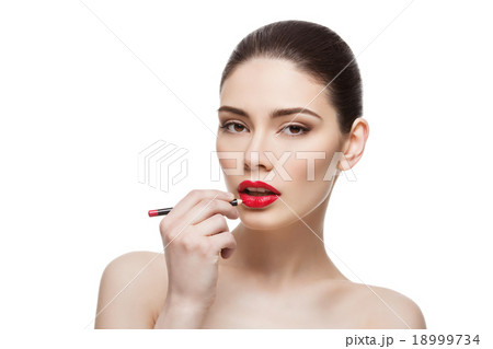Beautiful girl with lip pencil 18999734