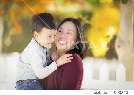 Chinese Mom Playing and Holding Her Mixed Race Boy Chinese Mom Playing and Holding Her Mixed Race Boy 19002489