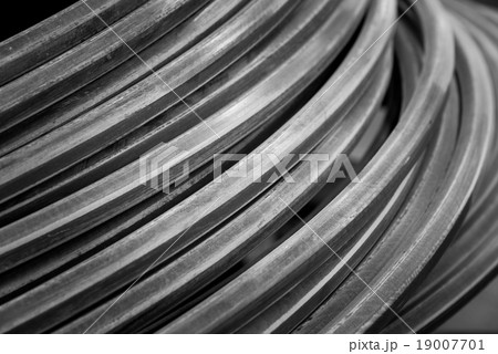 Close up metalic wire coil Close up metalic wire coil 19007701