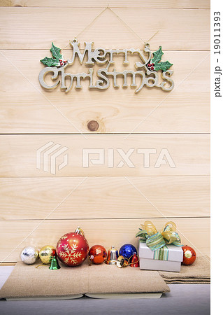 Christmas cup with decorated on wooden table. Christmas cup with decorated on wooden table. 19011393