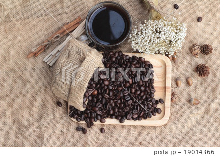 Roasted coffee beans with hot coffee 19014366