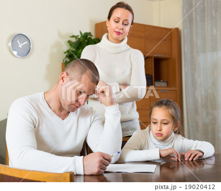 Sad family having financial problems 19020412