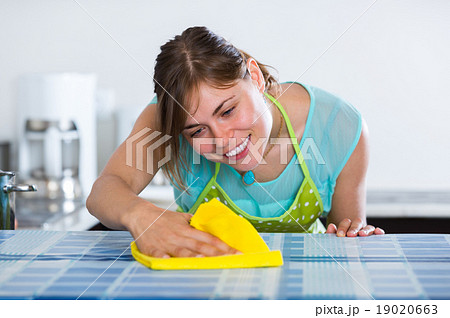 maid doing professional clean-up maid doing professional clean-up 19020663