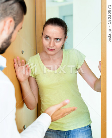 Young upset couple quarreling Young upset couple quarreling 19020971