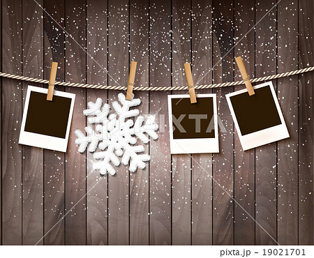 Christmas background with photos and a snowflake. Christmas background with photos and a snowflake. 19021701