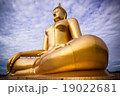 largest golden Buddha with blue sky as a backdrop. 19022681