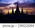 The silhouette of a temple at dusk. 19022684