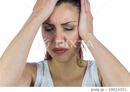 Close-up of stressed woman suffering from headache Close-up of stressed woman suffering from headache 19024351