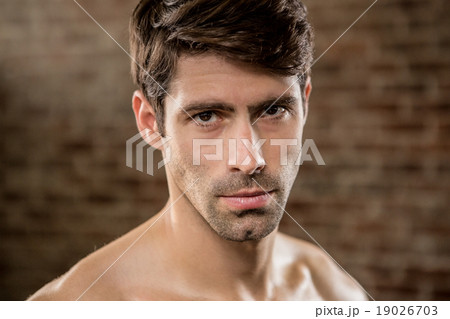 Portrait of a serious man 19026703