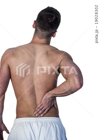 Rear view of man suffering from back pain Rear view of man suffering from back pain 19028302