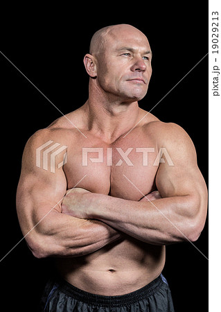 Muscular fit man with arms crossed Muscular fit man with arms crossed 19029213