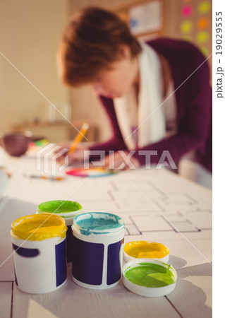 Graphic designer working at desk Graphic designer working at desk 19029555