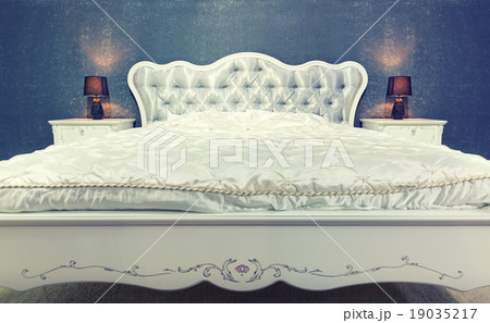 Nice bed in typical contemporary setting Nice bed in typical contemporary setting 19035217