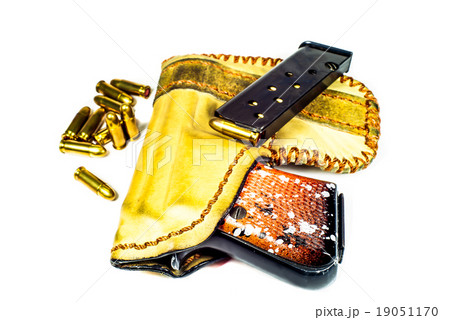 6.35 mm handgun on white background. 6.35 mm handgun on white background. 19051170