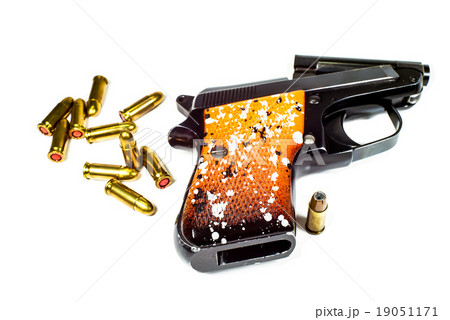 6.35 mm handgun on white background. 6.35 mm handgun on white background. 19051171