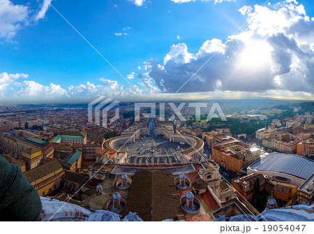 St. Peter's Square on cloudy sky, Vatican, Italy 19054047