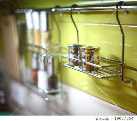 Salt Cellar and spices in the kitchen railings Salt Cellar and spices in the kitchen railings 19057654