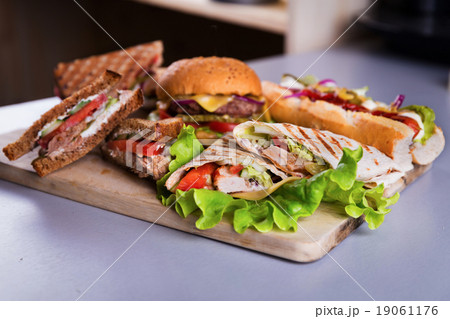 Fast food burger hot dog sandwiches chicken wrap 19061176