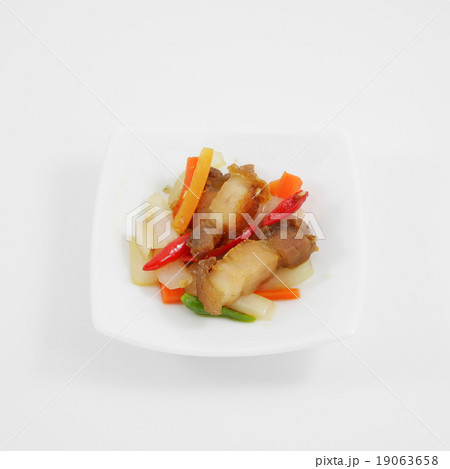 Thai stir fried crispy pork on the mini white dish 19063658