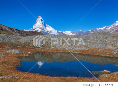 Matterhorn with lake in Swiss Alps Matterhorn with lake in Swiss Alps 19065491
