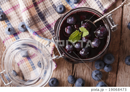 homemade blueberry jam in a glass jar close up homemade blueberry jam in a glass jar close up 19068473