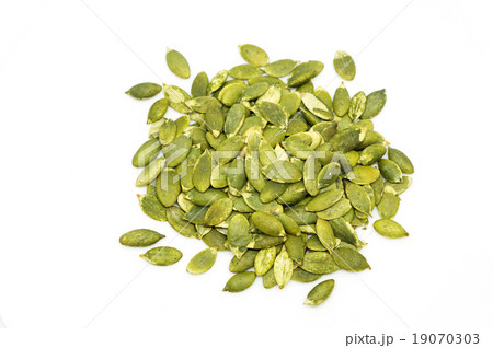 Pumpkin seeds on a white background 19070303