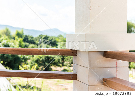 wooden railing on the balcony with pole 19072392