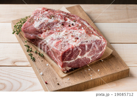 Photo of raw meat. Pork neck with herbs Photo of raw meat. Pork neck with herbs 19085712